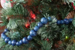 9-Foot Vintage Rustic Stained Dark Navy Blue Matte Wood Bead Garland Christmas Tree Decoration 10 9-Foot Vintage Rustic Stained Dark Navy Blue Matte Wood Bead Garland Christmas Tree Decoration -Night Christmas Shop SpeckledBlueGarlandonTree